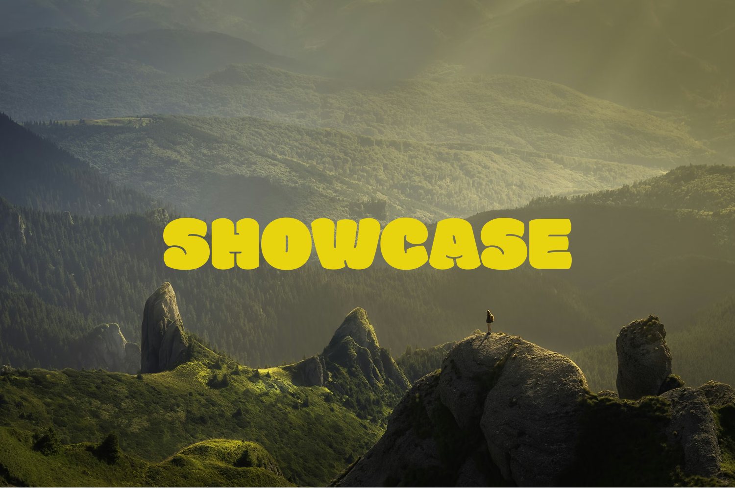 Showcase title over scenic mountain landscape with lone person standing on rocky peak at sunset