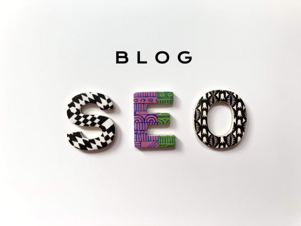Colorful patterned wooden letters spelling “SEO” arranged below the word “BLOG” on a white background.